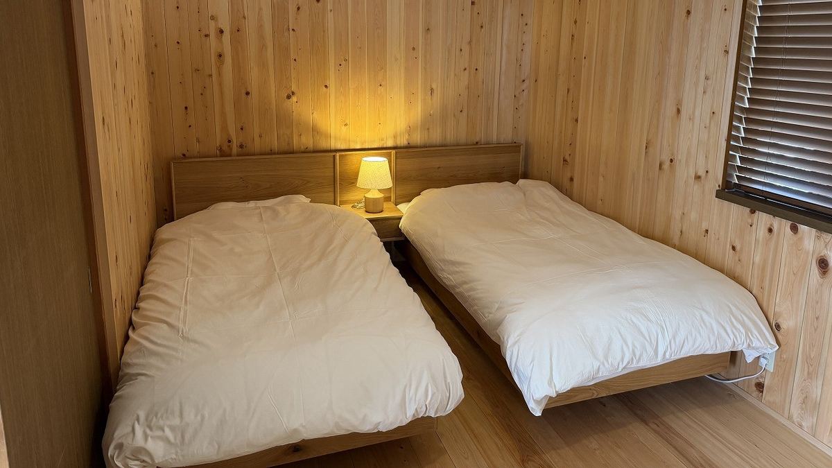 The main bedroom, with two beds side by side