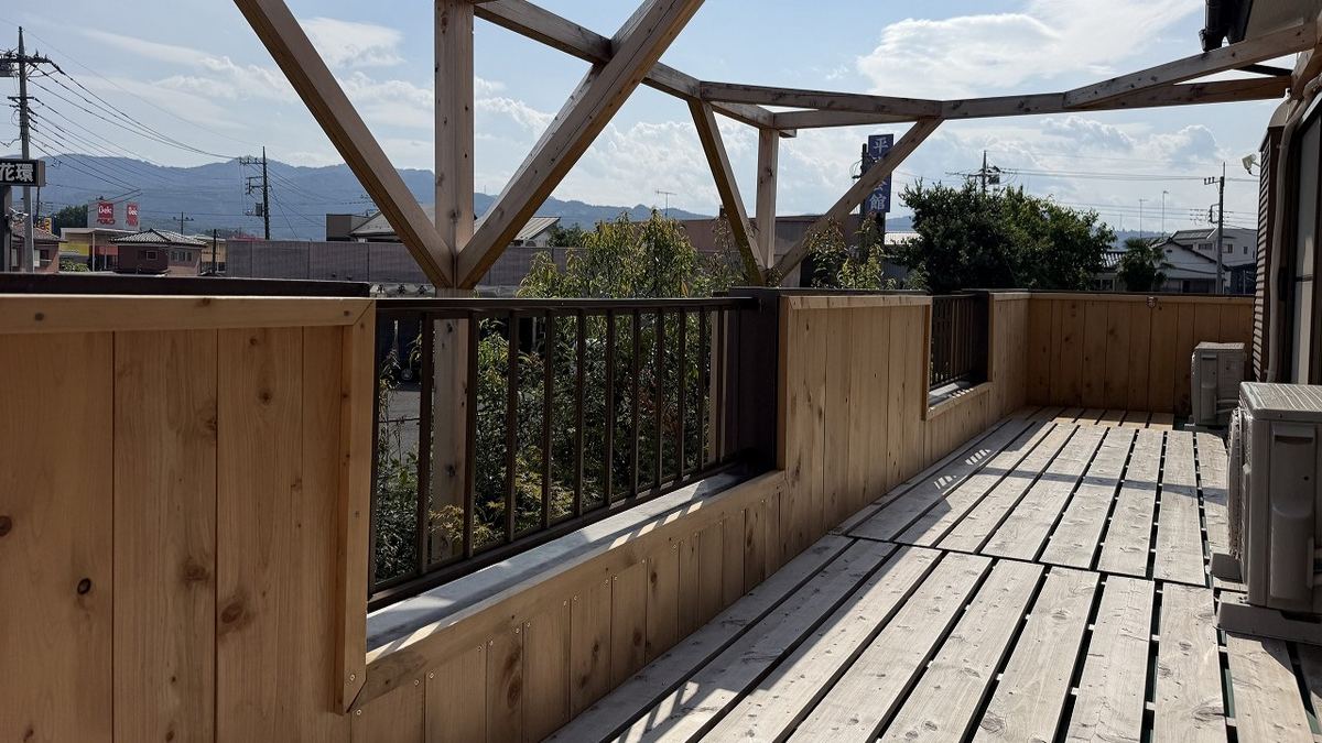 The covered terrace upstairs, and the view of the hills